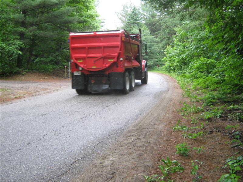 Single dump truck on N. Waseosa